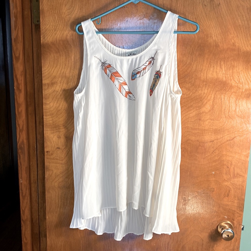Sleeveless cream top